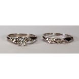Diamond and 14k white gold wedding ring set Featuring (1) full-cut diamond, weighing approximately