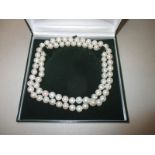 A cultured pearl necklace, each pearl approx. 1cm