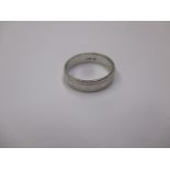 A platinum ring marked 950, approx. weight 6.2g