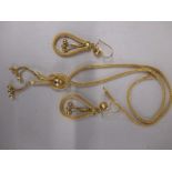 An 18ct gold necklace and earring set, approx. weight 27g