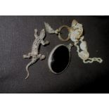 A marcasite lizard brooch and other costume jewellery