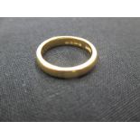 A 22ct gold wedding band, approx. weight 5g