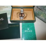 A ladies Rolex perpetual oyster watch with box and paper work