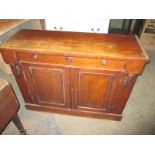 A 19th century mahogany dresser base