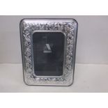 An silver easel type photo frame marked 925