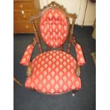 A Victorian upholstered spoon back parlour chair