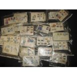 A quantity of stamps on first day covers