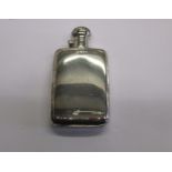 A sterling silver hip flask