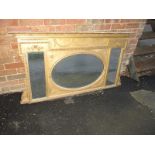 A large antique gilt wood over mantle triple mirror