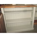 A painted deep shelf bookcase