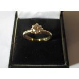 An 18ct yellow gold, champagne diamond solitaire ring, the stone being approx. .7ct