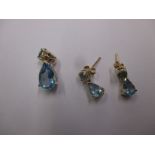 A pair of 18ct gold and aquamarine earrings and matching necklace pendant