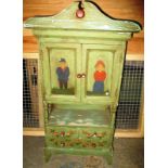 A continental painted pine cupboard