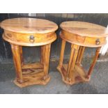 A pair of hardwood bedside lamp tables with single frieze drawer