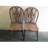 Two early 20th century wheelback chairs