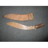 A vintage Kukri in sheath