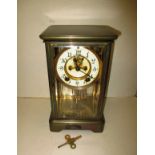 A four glass mantel clock with Brocot escapement and enamel dial