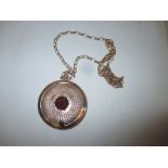 A 9ct rose gold necklace and large locket pendant, approx weight 17.4g