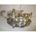 A 1916/17 sterling silver 3 piece tea set and a later silver tray, approx. weight 1840g