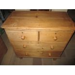 A 19th century pine chest of 2 short over 2 long drawers