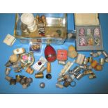 A quantity of vintage sewing items to include silver thimbles