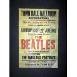 A vintage concert poster advertising the Beatles at Abergavenny