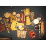 A quantity of vintage musical instruments to include African tribal items