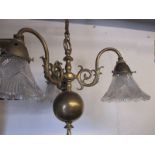 An early 20th century 3 branch ceiling light with glass shades