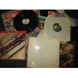 A quantity of 12inch vinyl records to include the white album by the Beatles