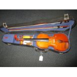 A violin in hard case with 2 bows