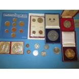 A small parcel of vintage coins and medallions