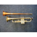 A vintage Corton trumpet and a small post horn