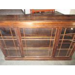 A 19th century glazed door bookcase