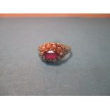 A yellow gold Ruby and pearl oval cluster ring, approx. size O ½