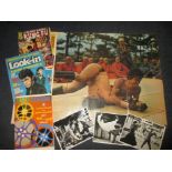 A vintage cinema film selection booklet with Bruce Lee poster, photographs and comics