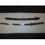 A Japanese WWII Katana sword and scabbard, signed to hilt