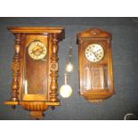 2 vintage wood cased wall clocks