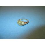 A 9ct yellow gold 7 stone peridot ring, approx. ring size O