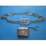 An Edwardian Art Nouveau silver nurses belt and a silver evening purse