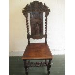 Antique chair with carved wood back panel dated 1633