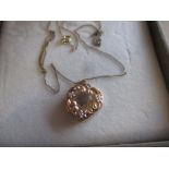 A 9ct gold necklace with locket pendant