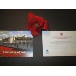 An original Paul Cummins Tower of London poppy with certificate and packaging