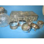 A quantity of silver topped jars and other white metal items