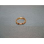 A 22ct gold wedding band, approx. weight 3.5g