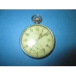 A WWII Bravingtons pocket watch with crowfoot and number to reverse