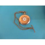A 9ct gold pocket watch and Albert chain