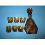 An amber glass art deco decanter set with 6 shot glasses