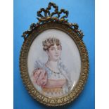 A 19th century portrait miniature in gilt metal frame, marked to reverse empress Josephine