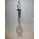 An Edwardian silver mounted decanter