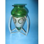 An art nouveau Liberty's tudric pewter vase with green glass liner